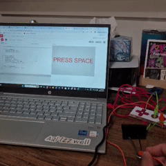 Tapping the binder clip connected to the SPACEBAR on the Makey Makey makes the “PRESS SPACE” text rapidly grow in size, creating a sudden pop/jump effect.