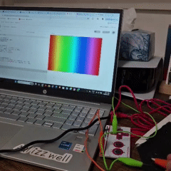 Pressing the graphite surface connected to the BOTTOM arrow on the makey makey - changes the rainbow background, making the colors appear brighter and more vivid.